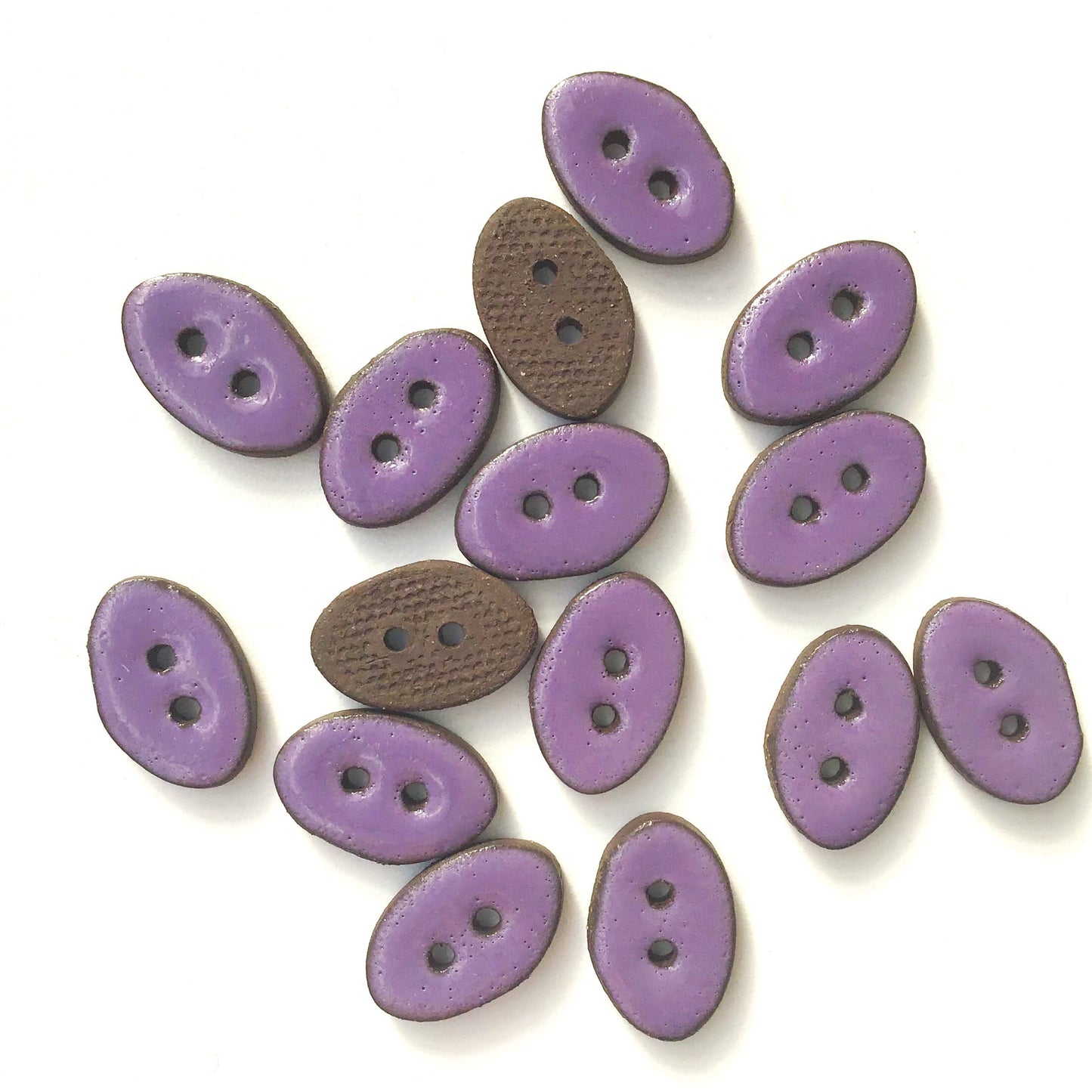 Purple Oval Clay Buttons on Black Clay - 1/2" x 3/4" (ws-175)