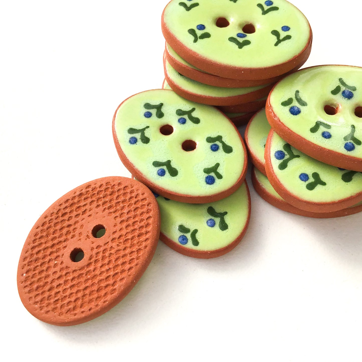 Green Ceramic Buttons with Small Blue Flowers - Oval Clay Buttons - 3/4" x 1 1/16" - 6 Pack (ws-95)