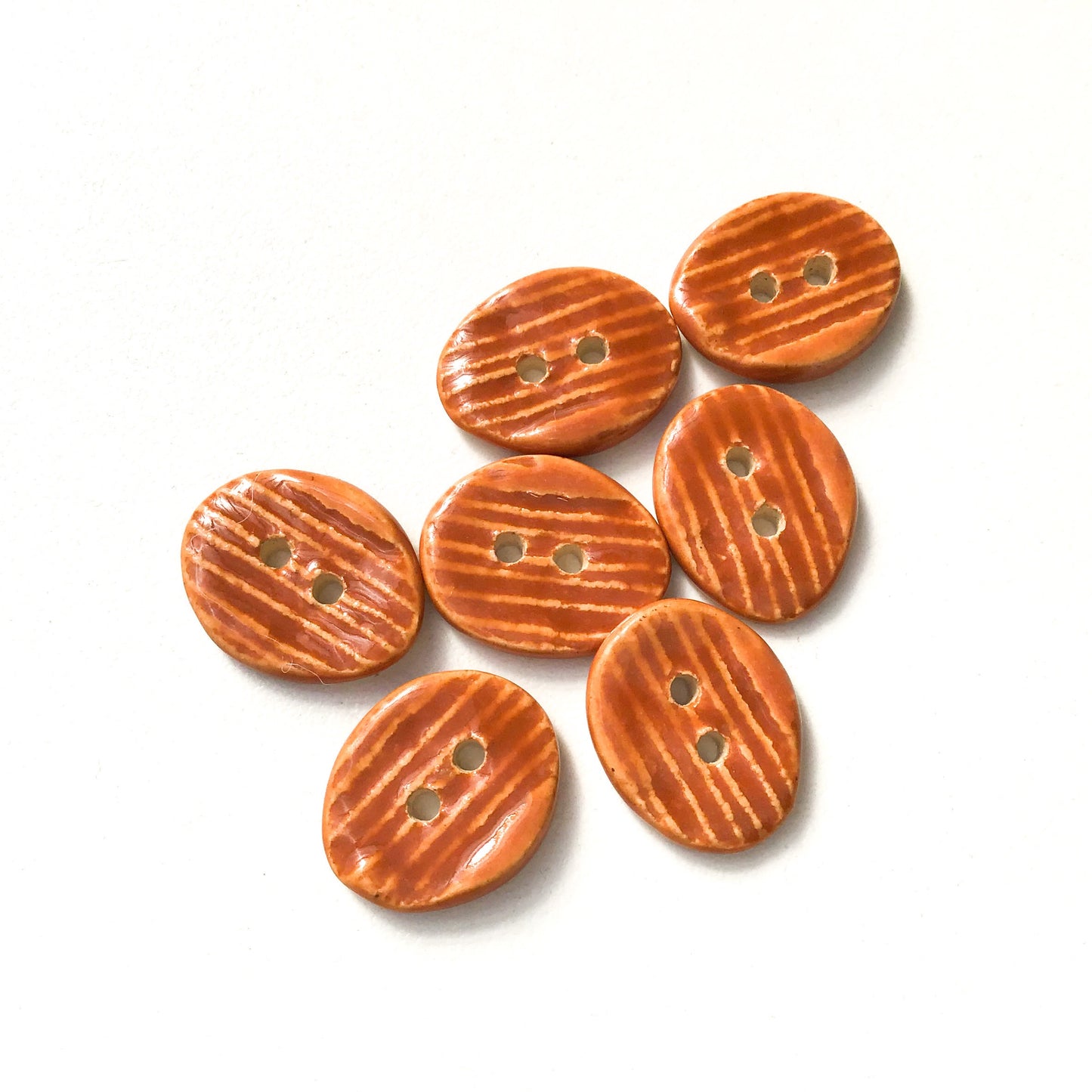 Orangish-Brown Textured Ceramic Buttons  9/16" x 11/16" - 7 Pack
